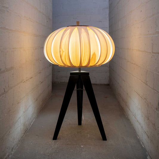 Baby Bloom tripod lamp is a contemporary table lamp made by Storm Furniture and sold by South Charlotte Fine Lighting