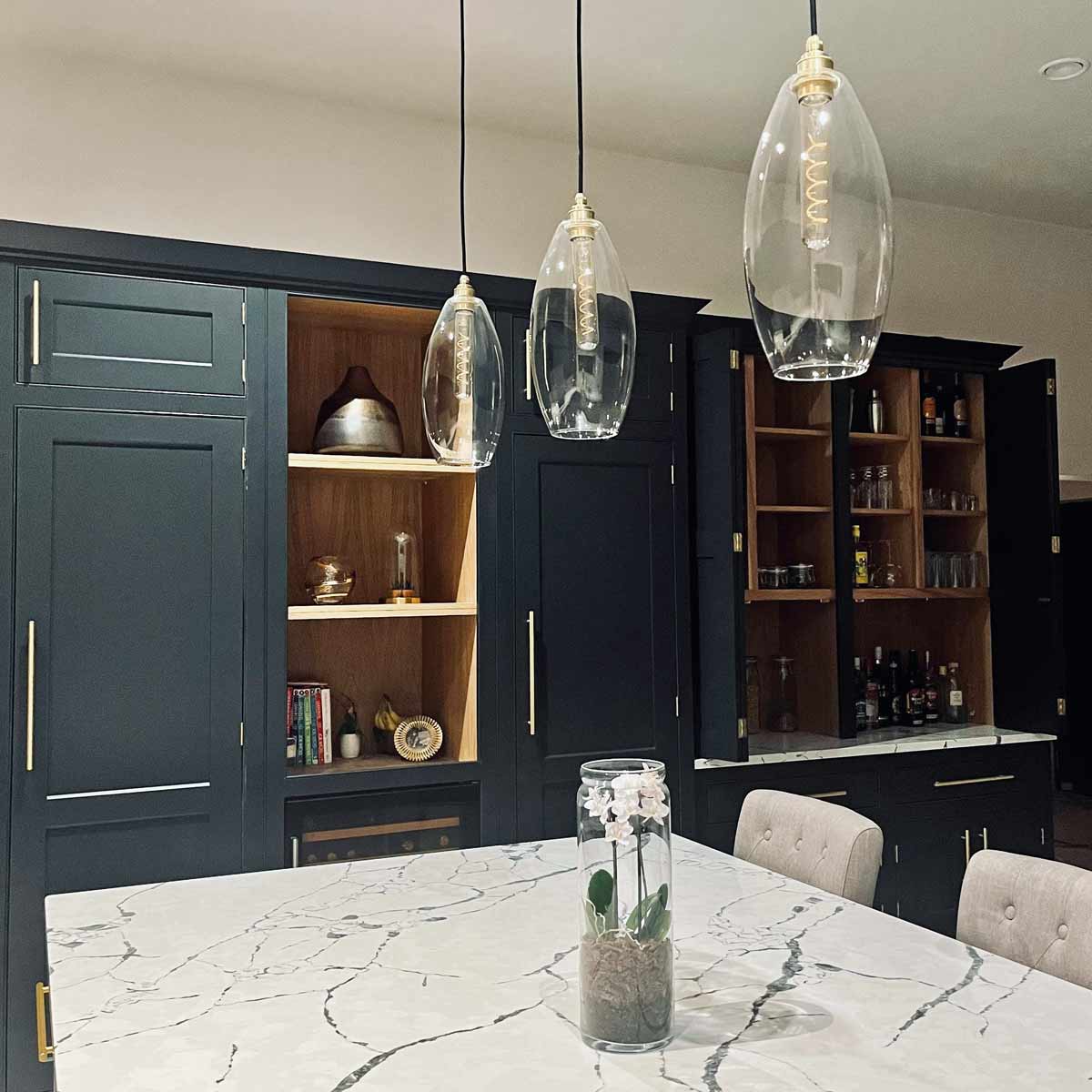 Kitchen glass pendants made by Leverint and sold by South Charlotte Fine Lighting in the UK