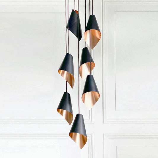 Arcform pendant lights cluster in black and copper - supplied by South Charlotte Fine Lighting