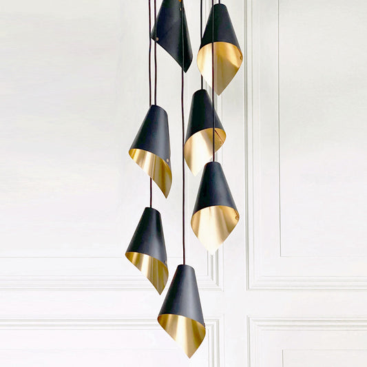 Pendant lights cluster in black and brass from Arcform and made in UK