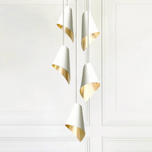 Beautiful Arcform ARC 5 Cascade Pendant lights in white and brushed brass, supplied by South Charlotte Fine Lighting