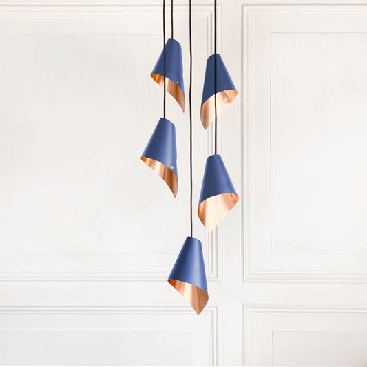 Arcform pendant lighting in blue and copper supplied by South Charlotte Fine Lighting.