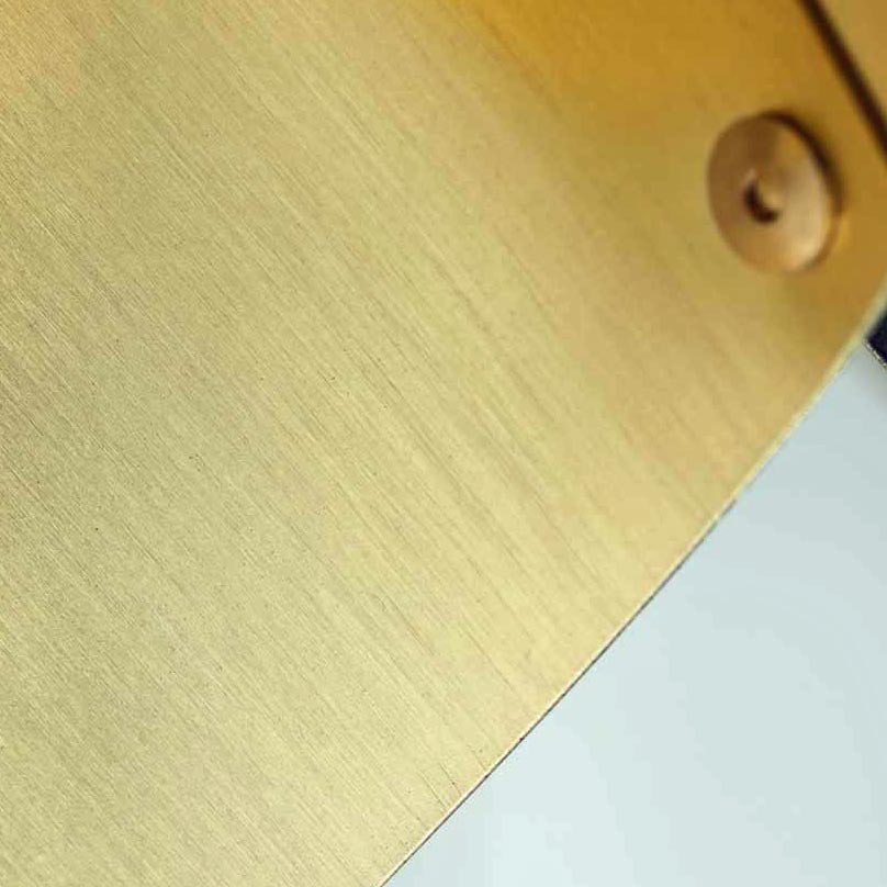 Brass detail on blue and brushed brass luxury ARC Wall Light supplied by South Charlotte Fine Lighting