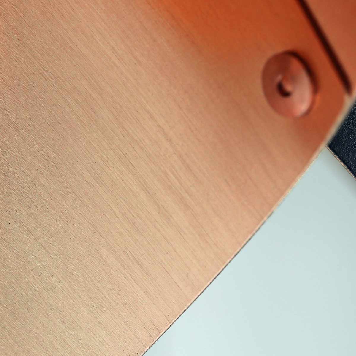 Copper detail on luxury ARC Wall Light supplied by South Charlotte Fine Lighting