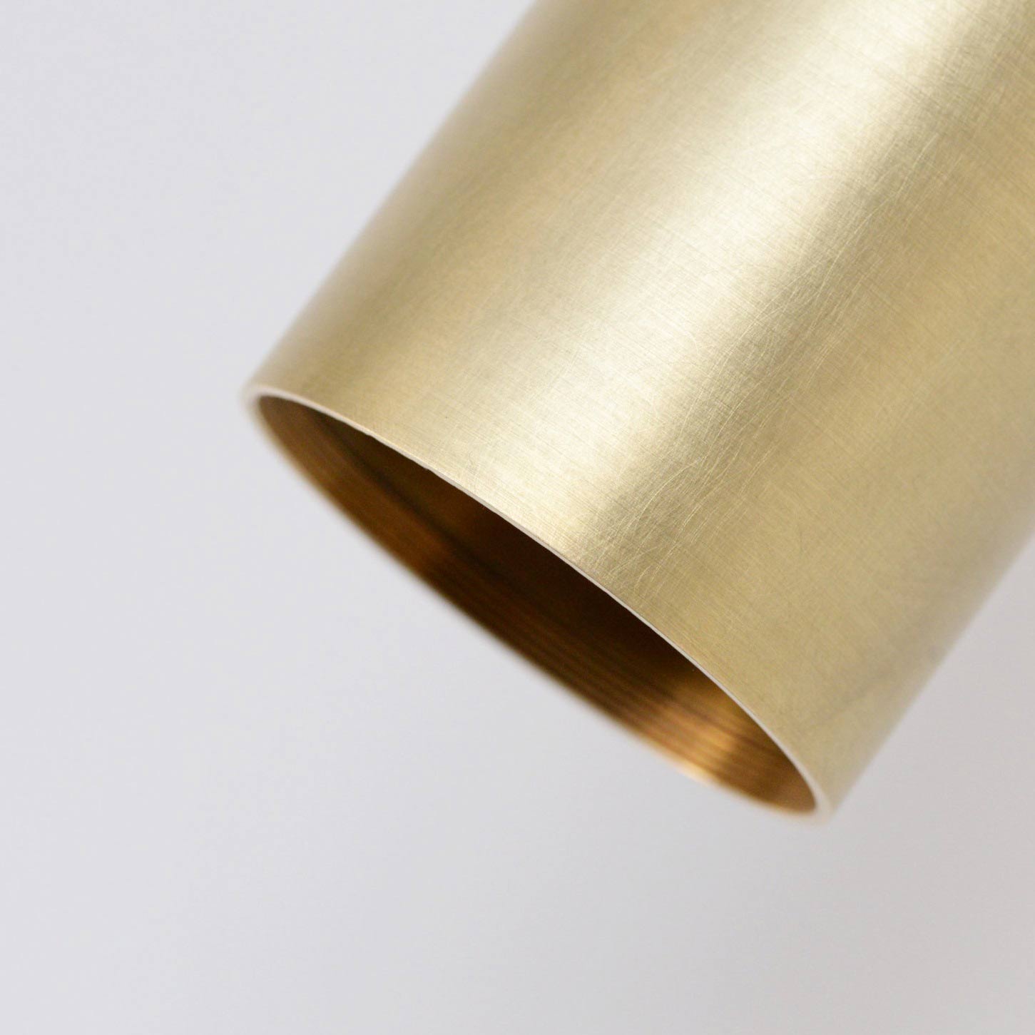 The VIDERE Wall Light head is made from solid brass and supplied by South Charlotte Fine Lighting